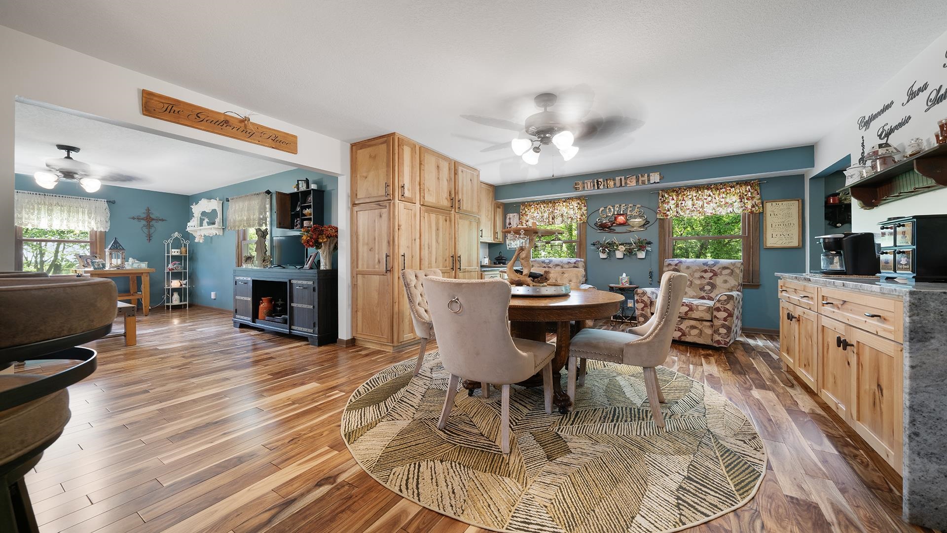 293 Briar Court Oregon, IL 61061 - Photo 12 of 58 a view of a dining room with furniture window and wooden floor