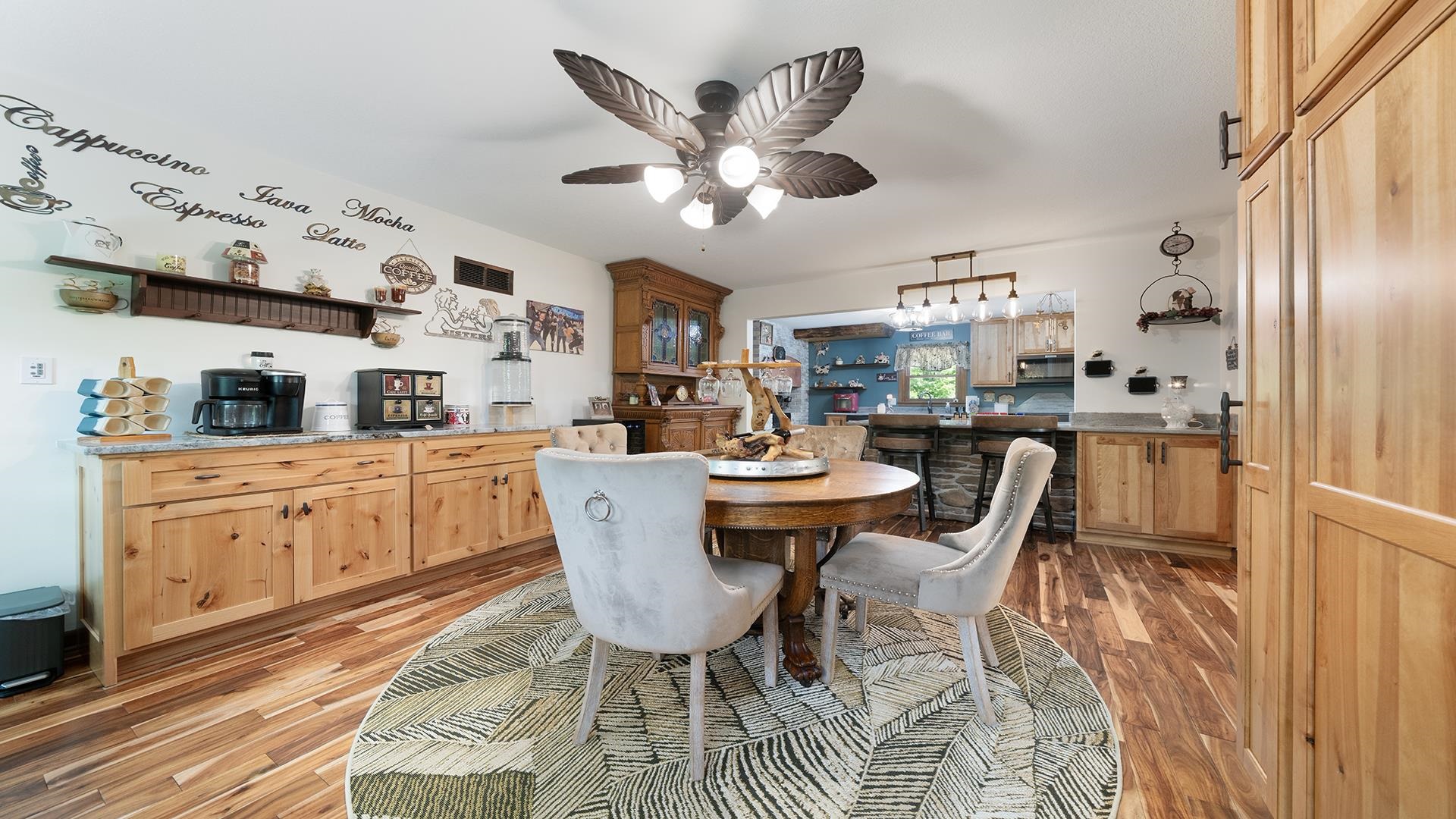293 Briar Court Oregon, IL 61061 - Photo 16 of 58 a dining room with granite countertop a table and chairs