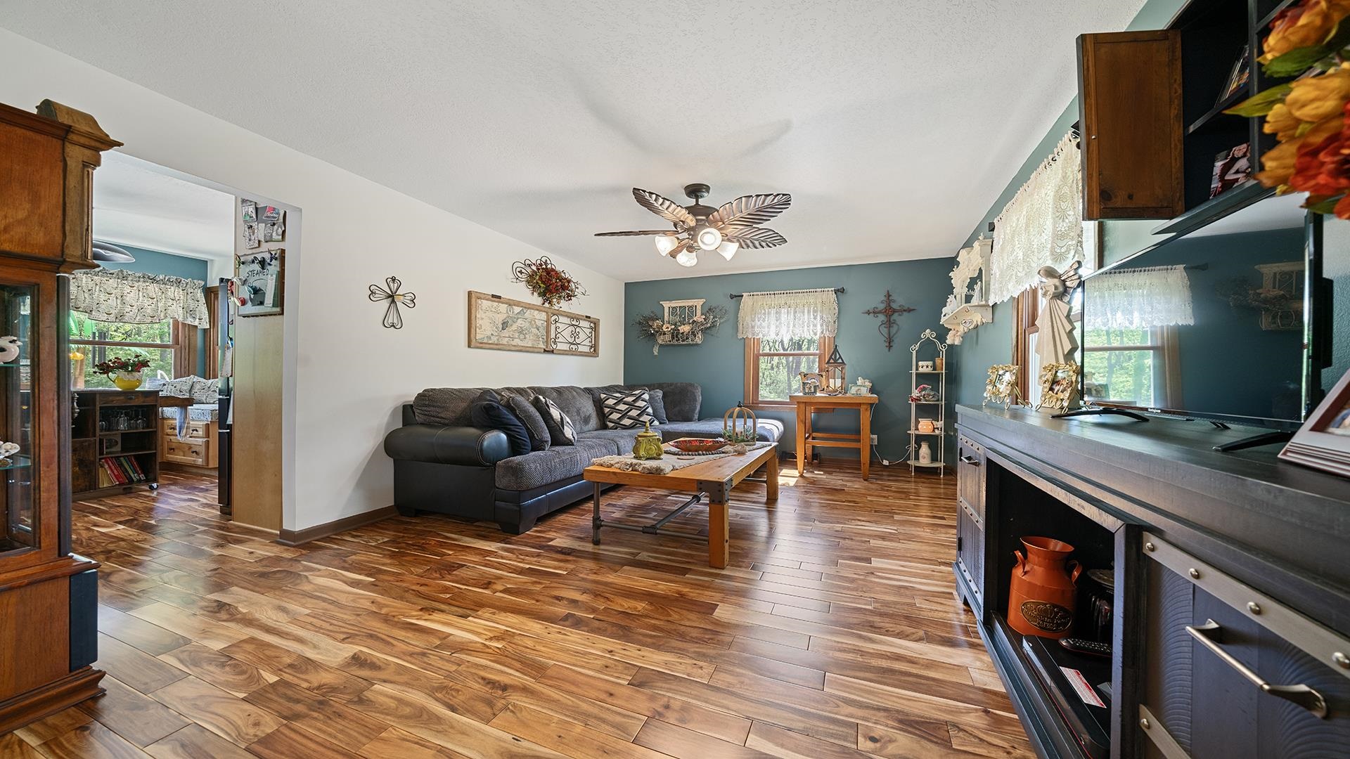 293 Briar Court Oregon, IL 61061 - Photo 17 of 58 a living room with furniture and a wooden floor