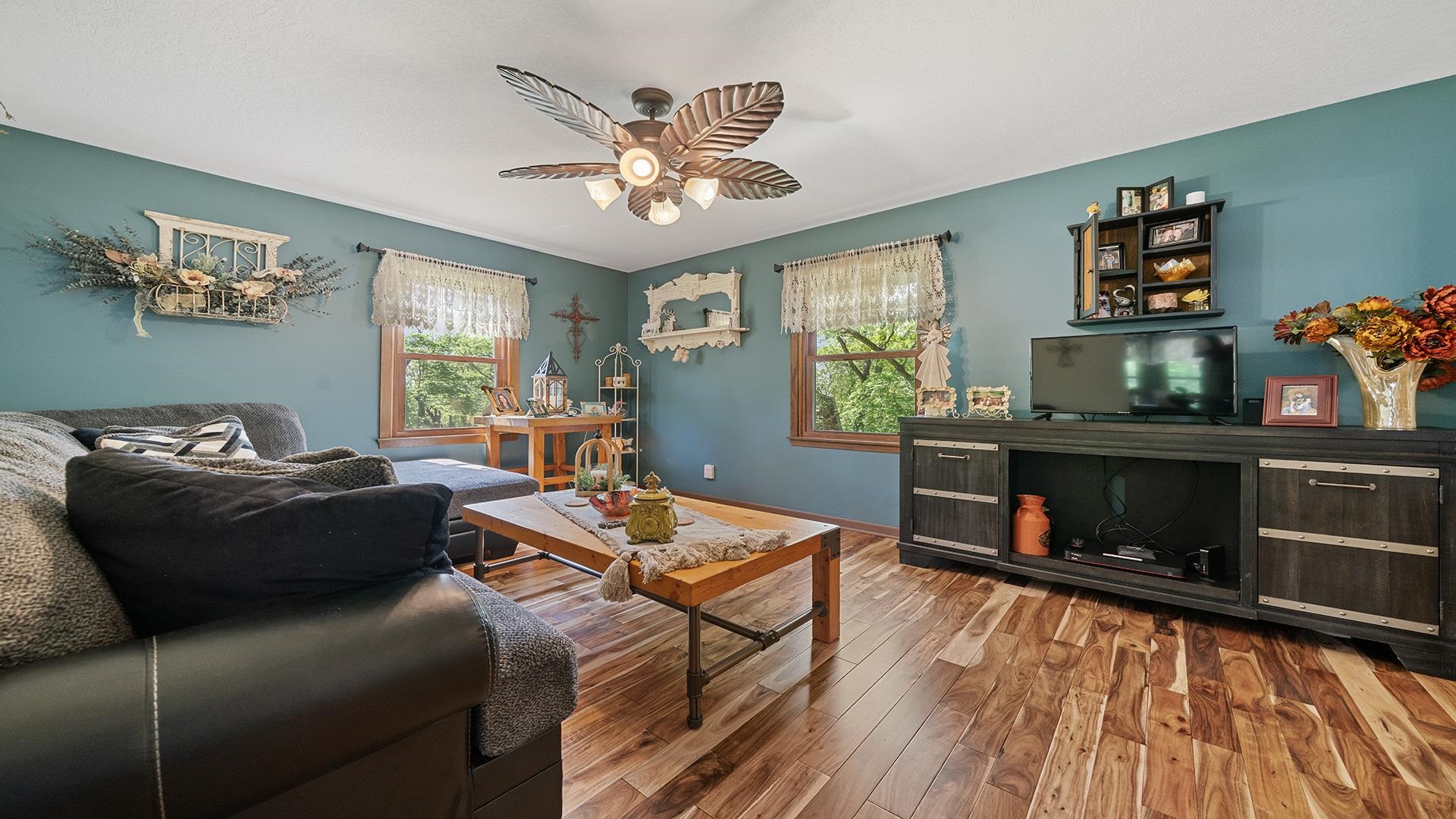 293 Briar Court Oregon, IL 61061 - Photo 18 of 58 a living room with furniture and a wooden floor