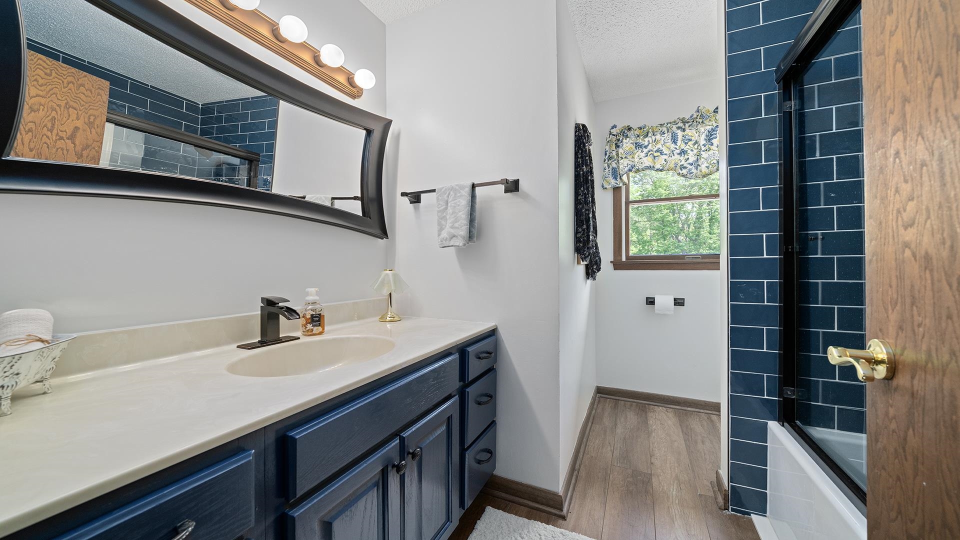 293 Briar Court Oregon, IL 61061 - Photo 27 of 58 a bathroom with a sink and a mirror