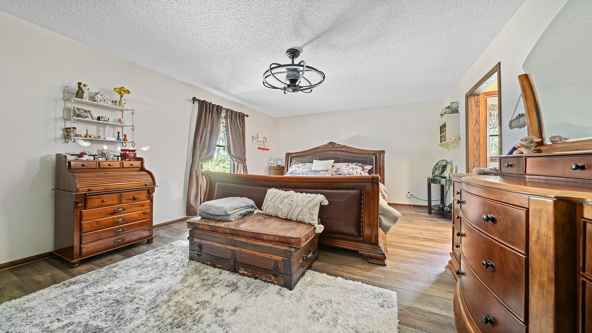 293 Briar Court Oregon, IL 61061 - Photo 34 of 58 a bedroom with furniture and a window
