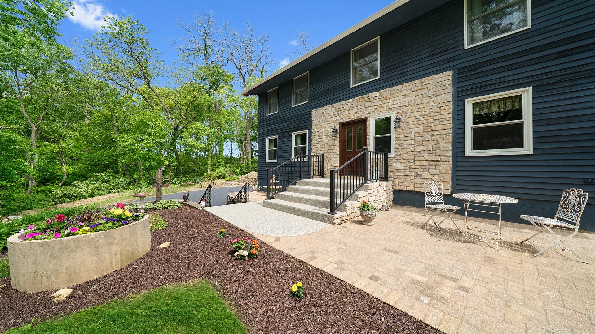 293 Briar Court Oregon, IL 61061 - Photo 53 of 58 a view of a house with backyard and sitting area