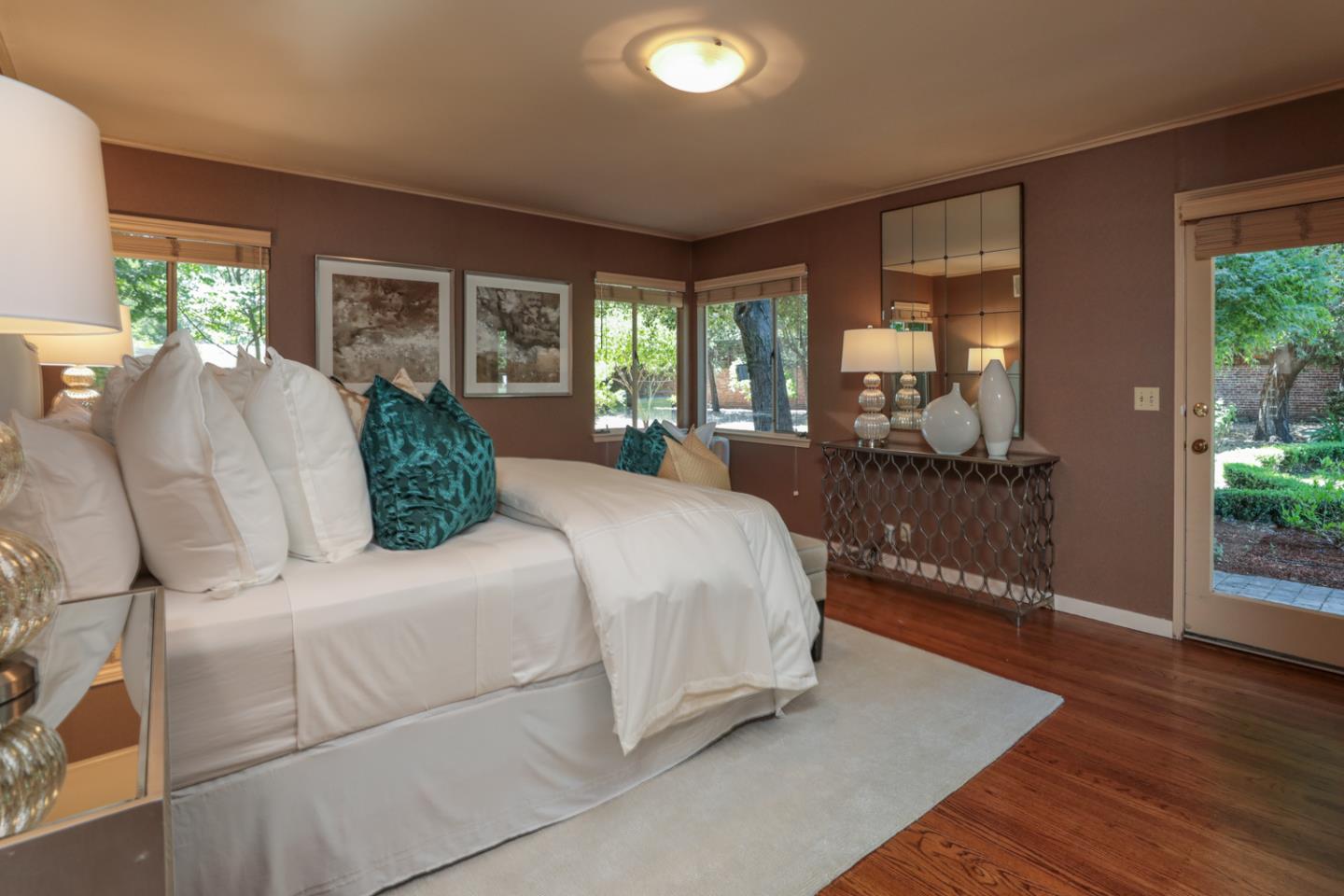 3 Irving Avenue Atherton, CA 94027 - Photo 11 of 22 a bedroom with a large bed and large windows