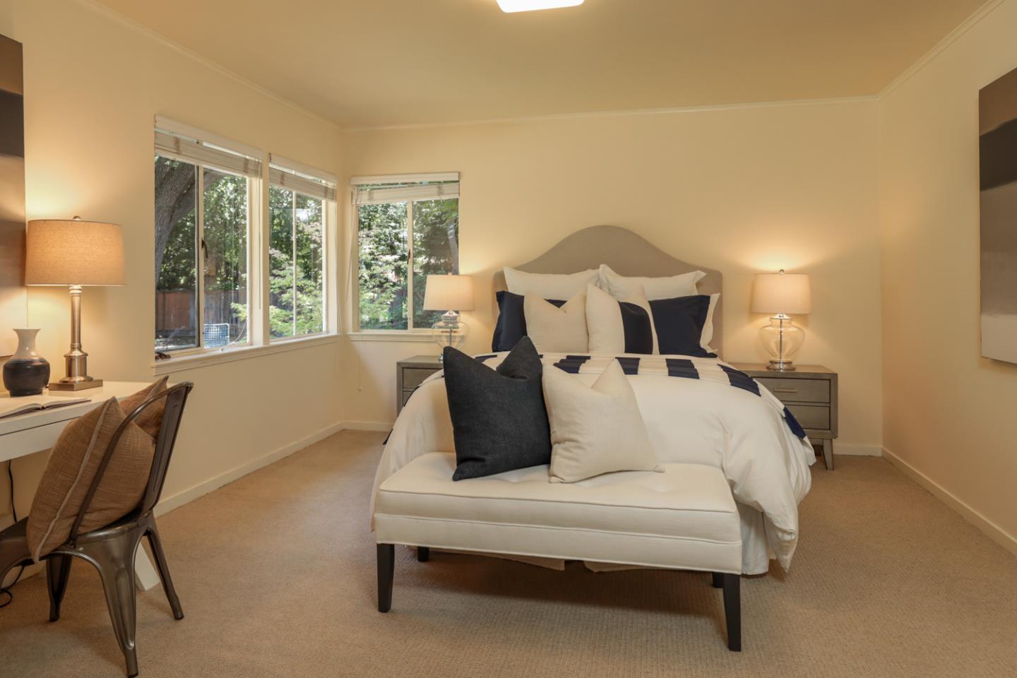 3 Irving Avenue Atherton, CA 94027 - Photo 12 of 22 a bed sitting in a bedroom next to a window