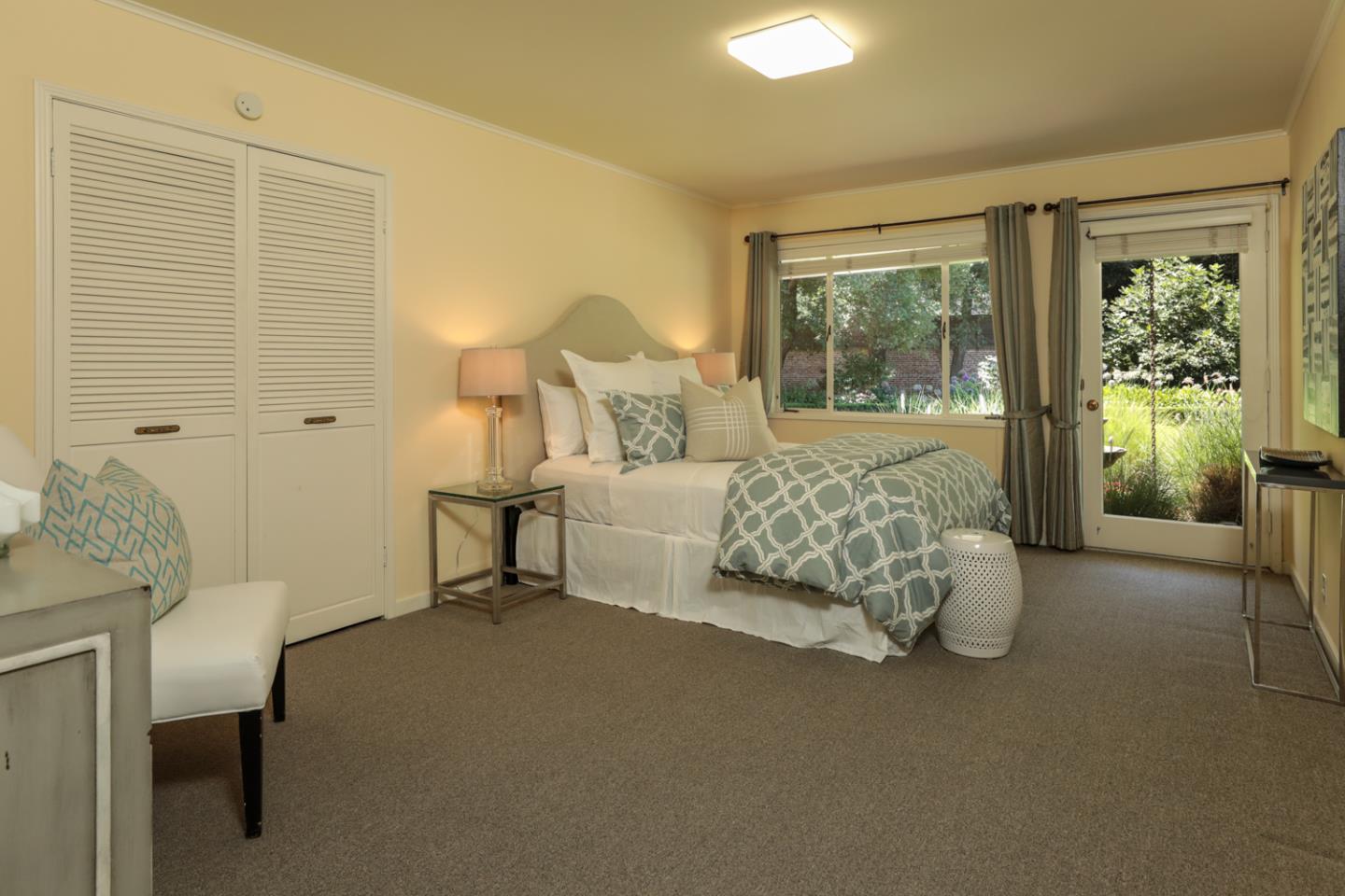 3 Irving Avenue Atherton, CA 94027 - Photo 13 of 22 a bedroom with a bed and a window