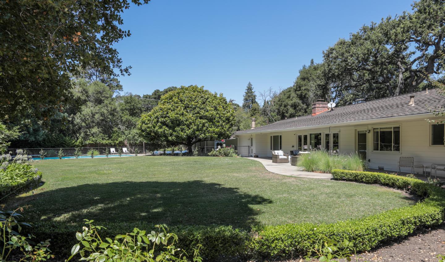 3 Irving Avenue Atherton, CA 94027 - Photo 17 of 22 a front view of a house with a yard and trees