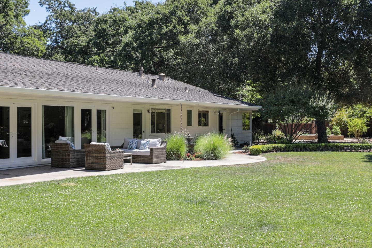 3 Irving Avenue Atherton, CA 94027 - Photo 18 of 22 a view of a house with a yard and sitting area