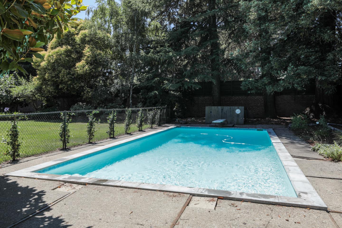 3 Irving Avenue Atherton, CA 94027 - Photo 19 of 22 a view of a backyard with a small park