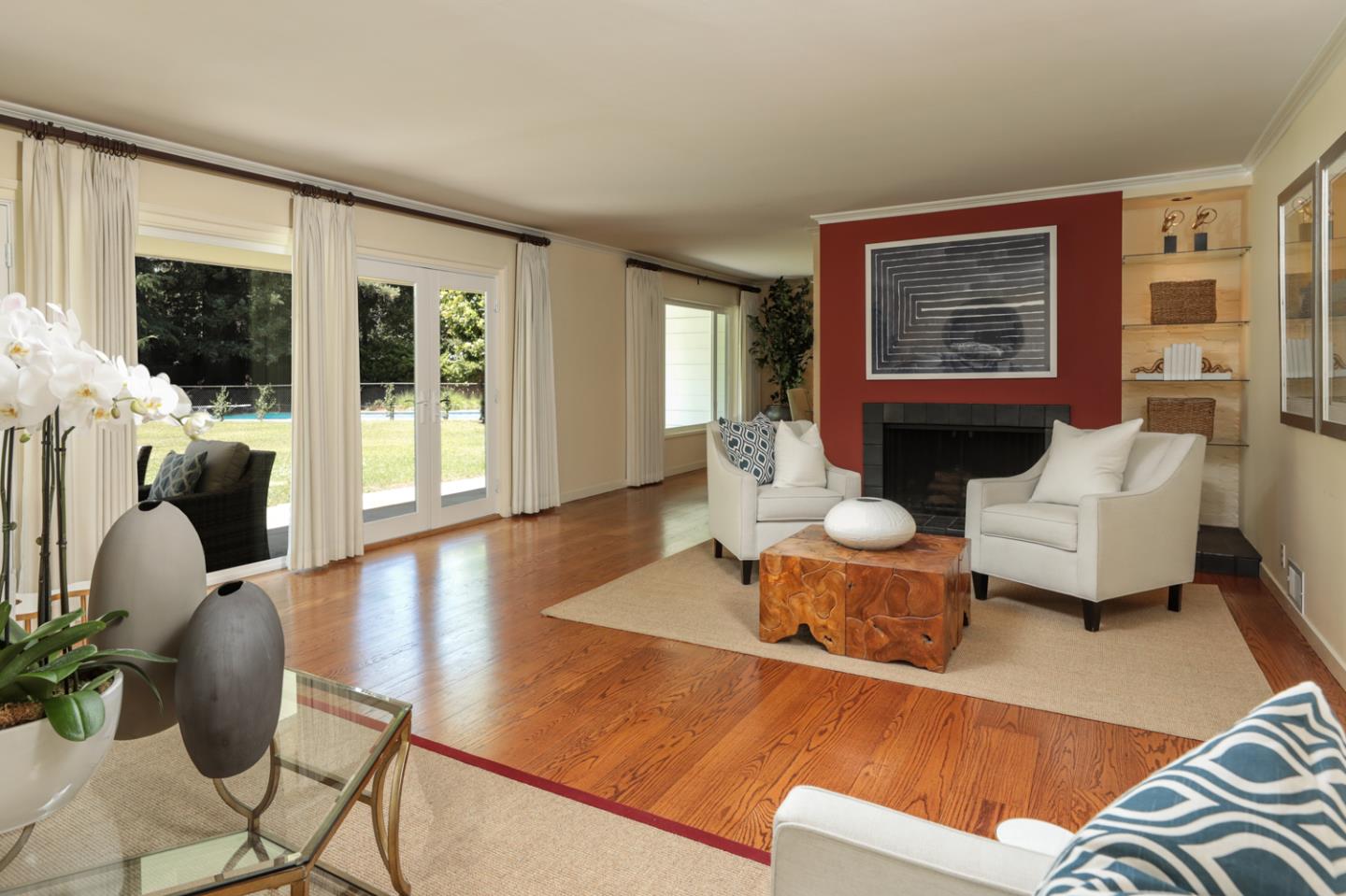 3 Irving Avenue Atherton, CA 94027 - Photo 4 of 22 a living room with furniture and wooden floor