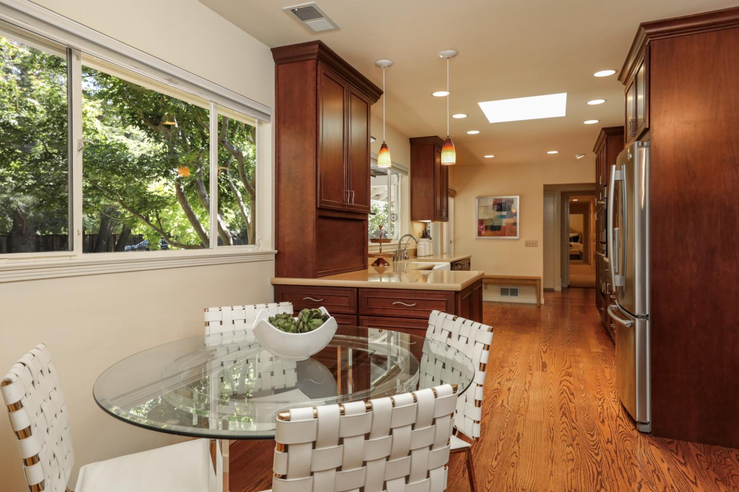 3 Irving Avenue Atherton, CA 94027 - Photo 7 of 22 a living room with furniture and a large window