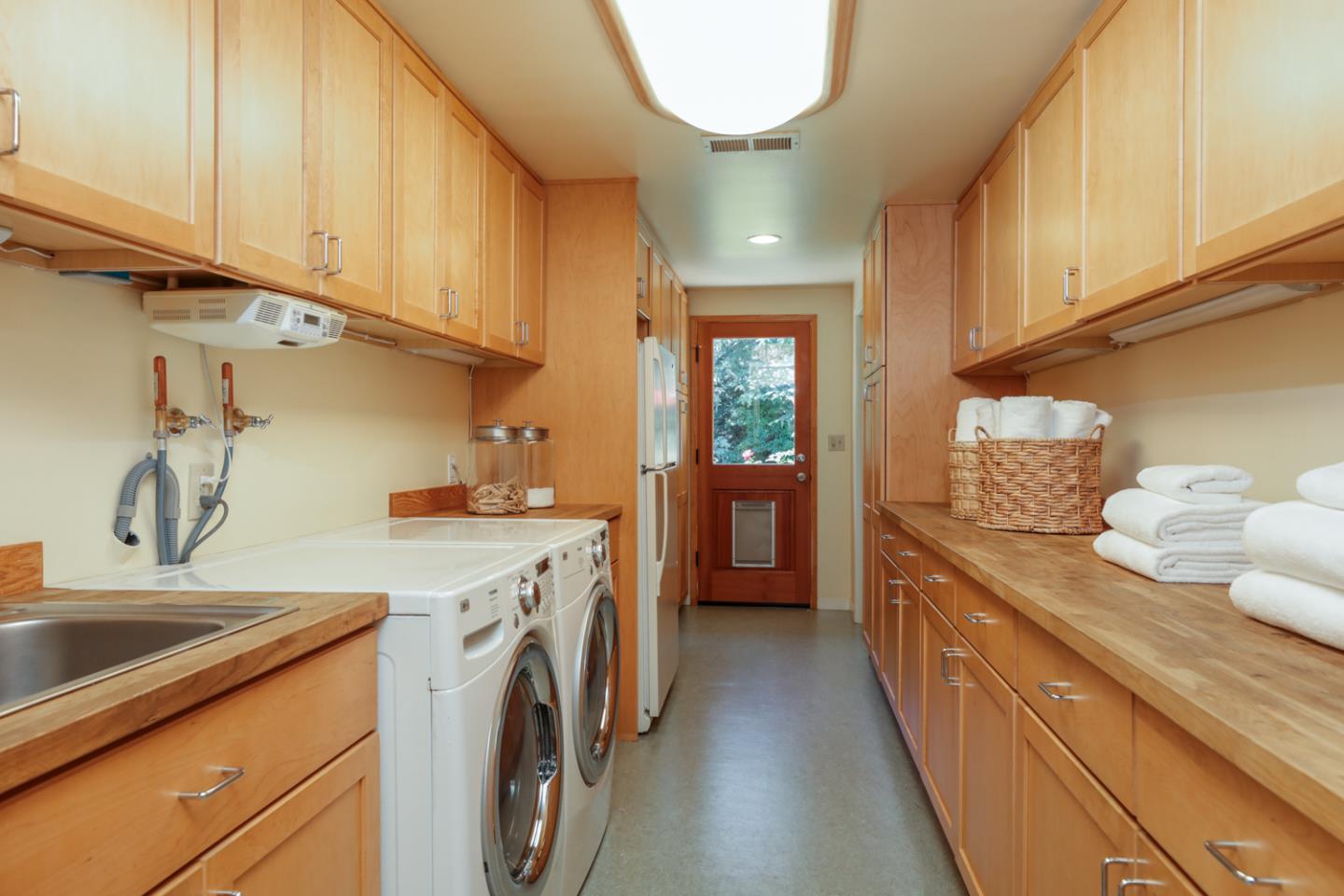 3 Irving Avenue Atherton, CA 94027 - Photo 10 of 22 a kitchen with granite countertop a sink a stove and cabinets