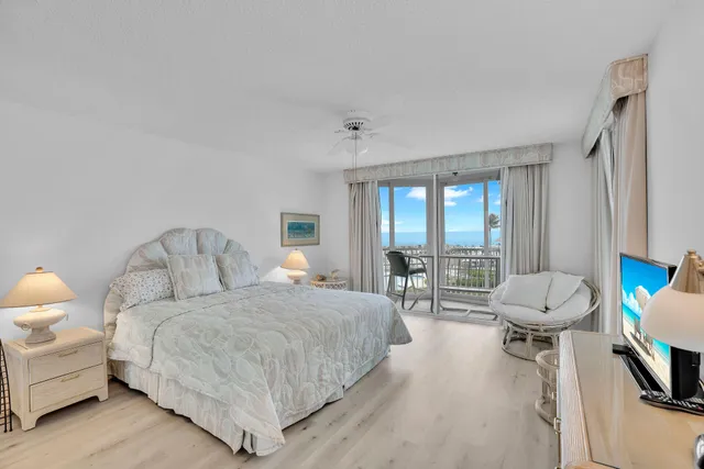 a view of a balcony and chairs