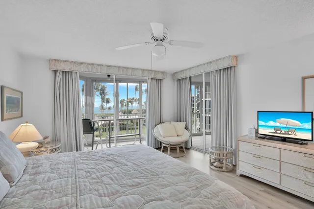 a bathroom with a sink double vanity and a shower