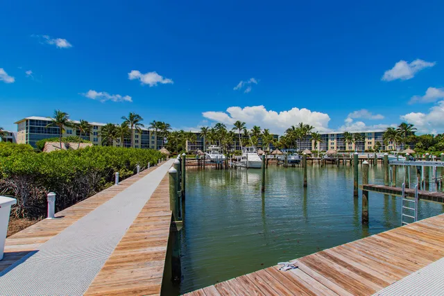 a view of a swimming pool with a lounge chair