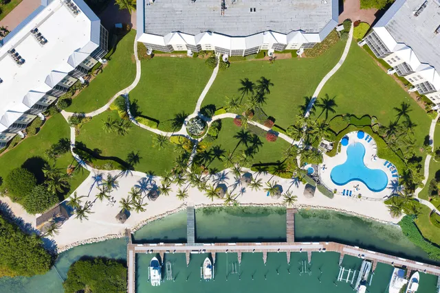 a view of a backyard with a table and chair