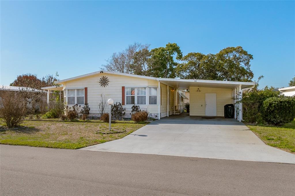 917 Cypress Street Sebastian, FL 32976 - Photo 1 of 80 a view of a house with backyard and trees