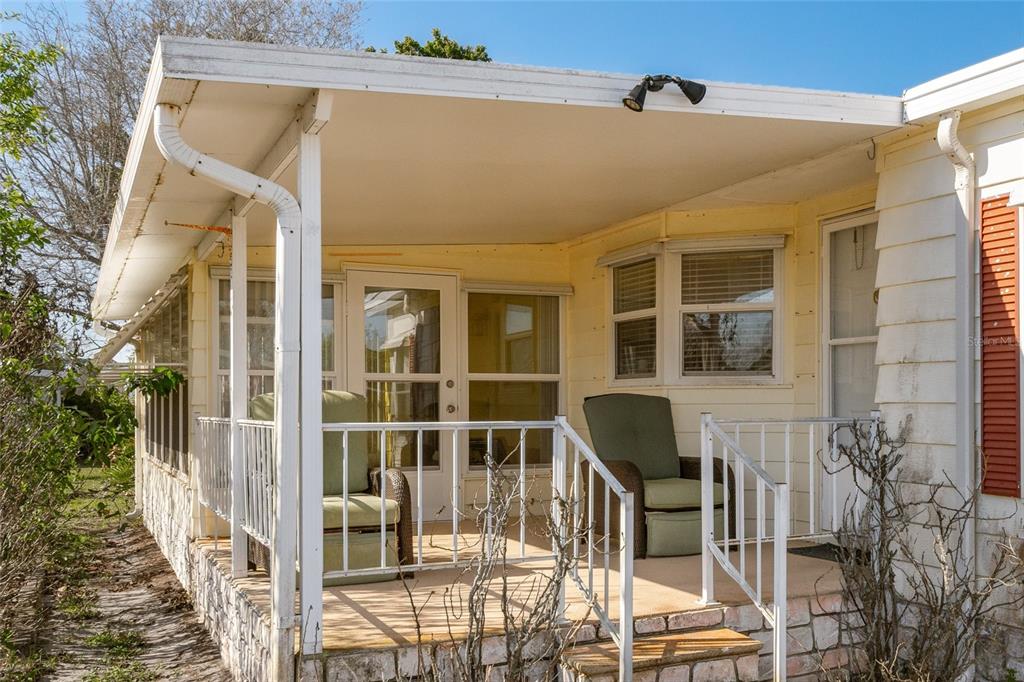 917 Cypress Street Sebastian, FL 32976 - Photo 2 of 80 a front view of a house with glass windows