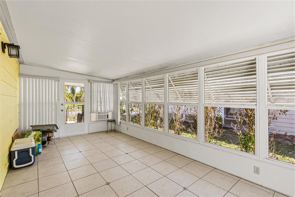 917 Cypress Street Sebastian, FL 32976 - Photo 27 of 80 a view of an empty room with a window