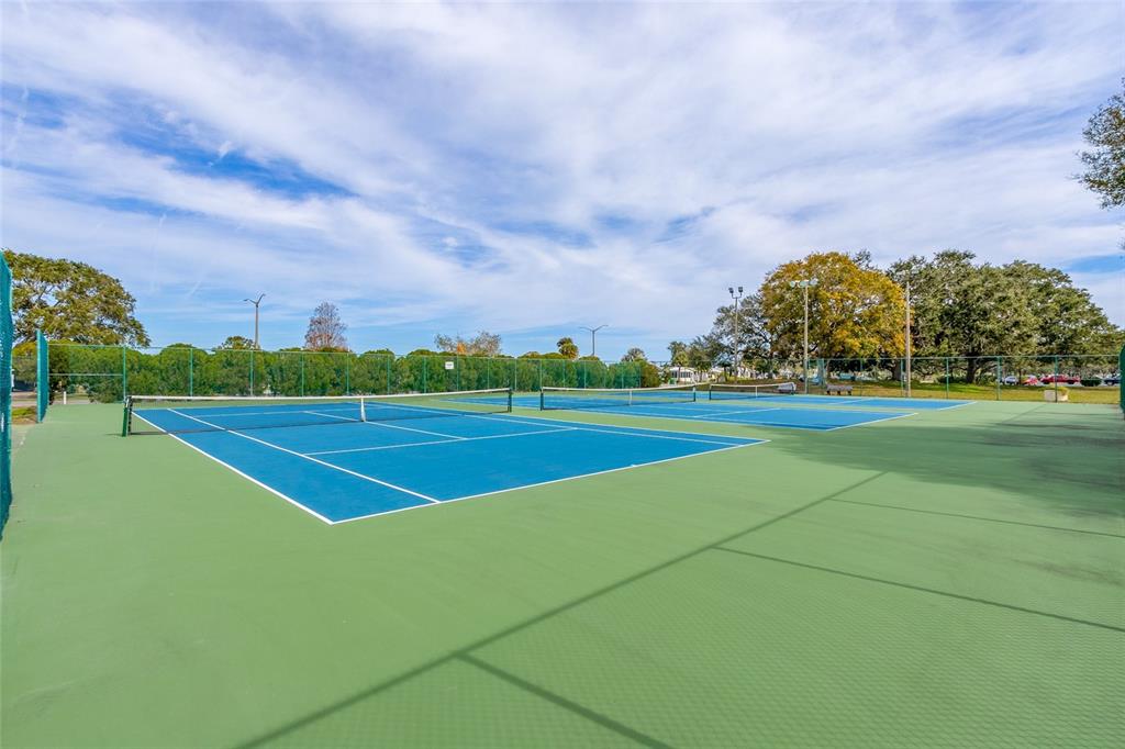 917 Cypress Street Sebastian, FL 32976 - Photo 71 of 80 a view of an outdoor space and tennis court