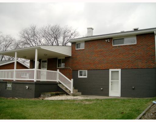 584 Lindsay Road Carnegie, PA 15106 - Photo 2 of 16 Exterior Back. Private rear yard, covered patio overlooking private woods. Room to grow.