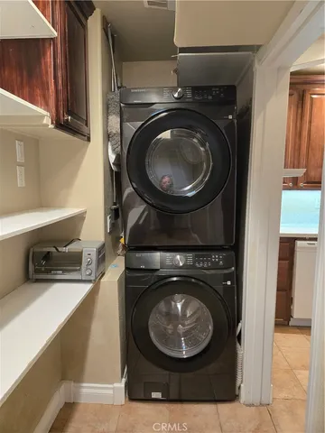 a view of a hallway with chandelier