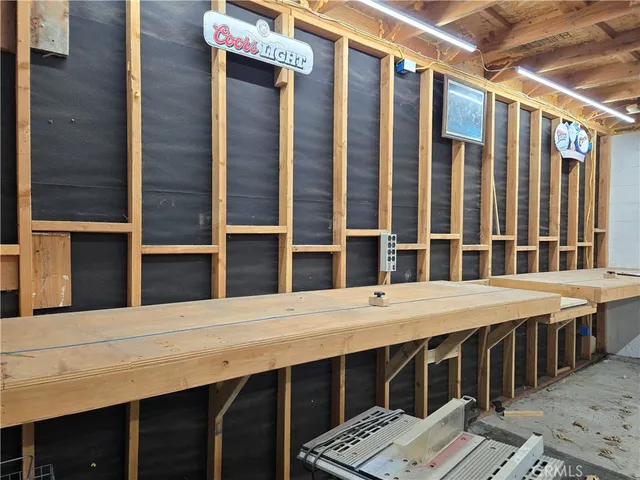 a view of outdoor space with deck and white umbrellas