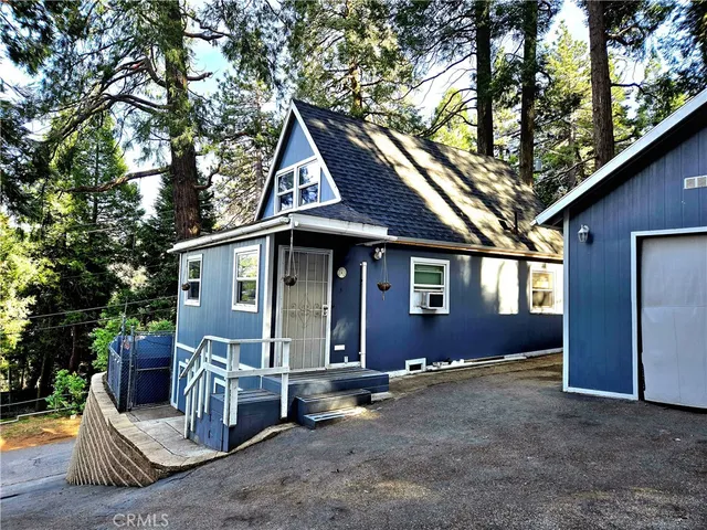 a backyard of a house with a yard and garage