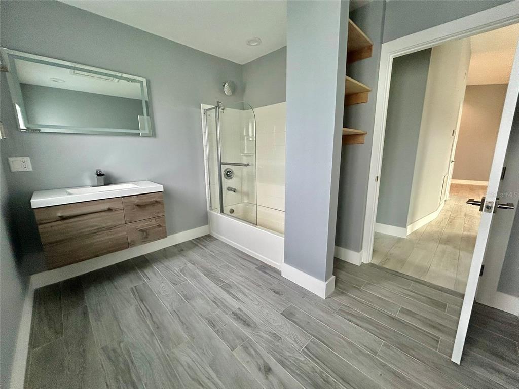 3112 Magnolia Way Punta Gorda, FL 33950 - Photo 16 of 20 a view of room with wooden floor and window