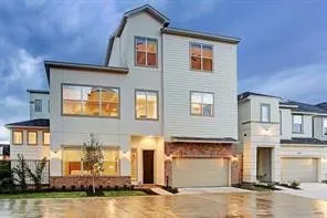 a front view of a house with swimming pool