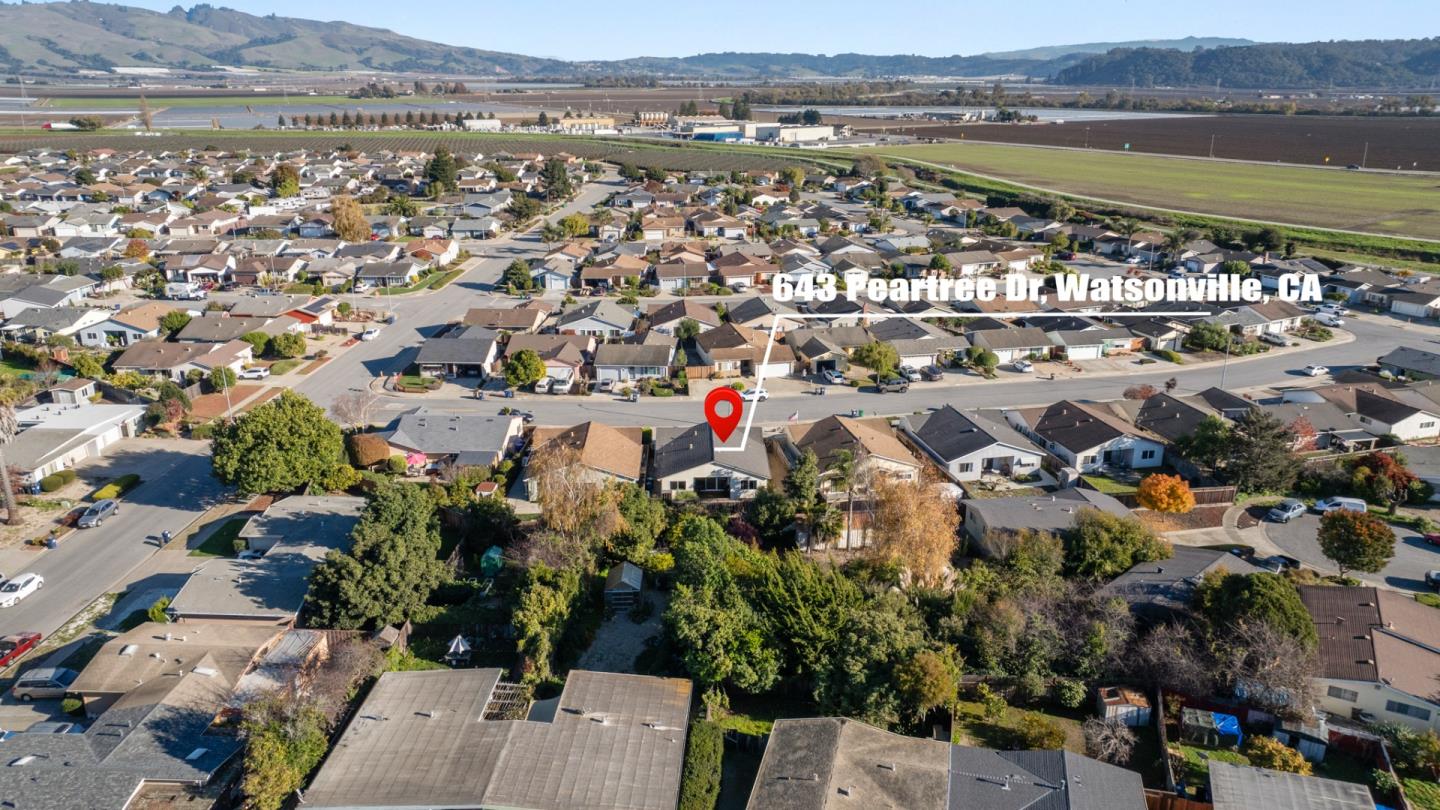 643 Peartree Drive Watsonville, CA 95076 - Photo 20 of 26 an aerial view of a city with lots of residential buildings ocean and mountain view in back