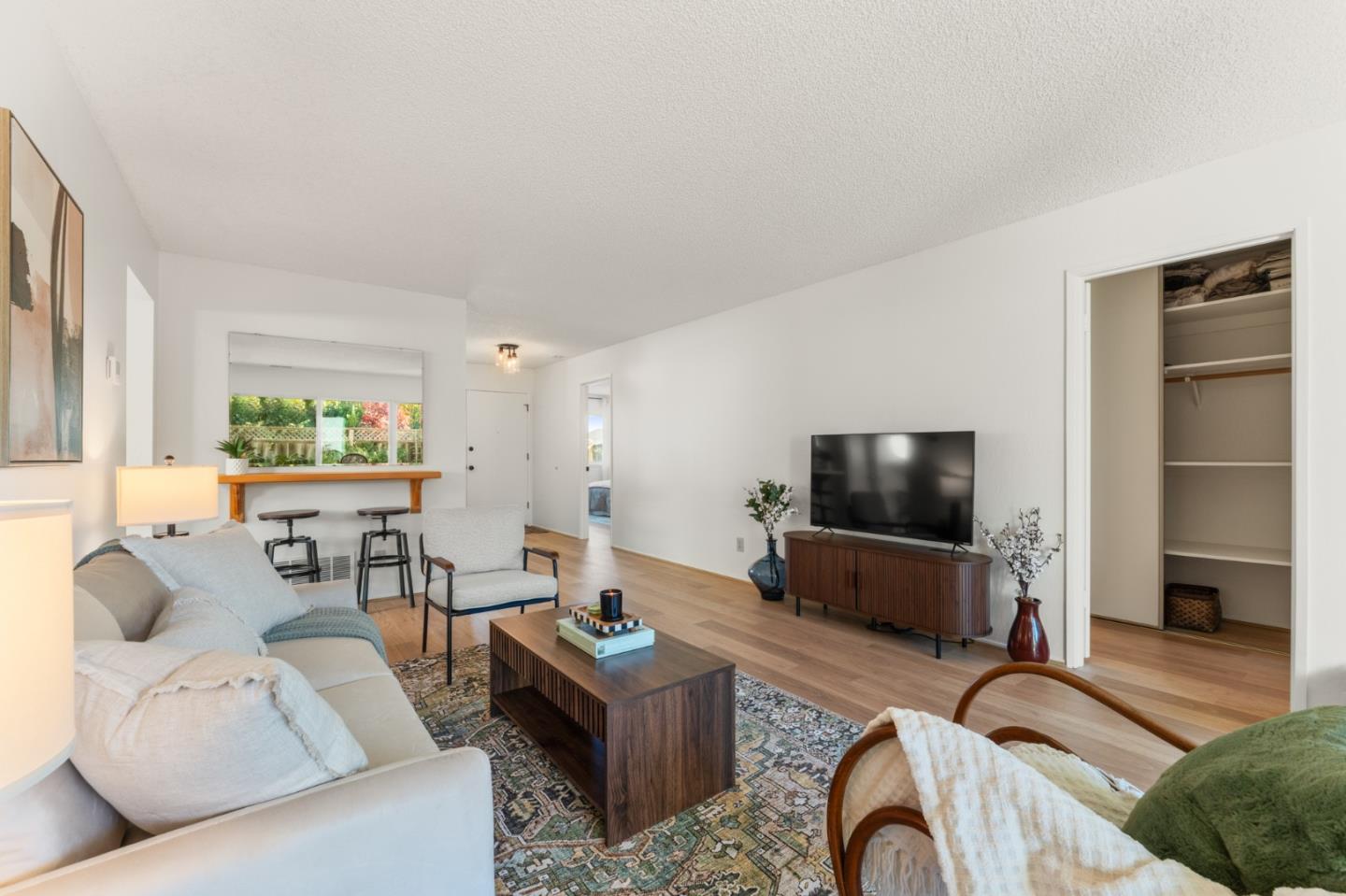 643 Peartree Drive Watsonville, CA 95076 - Photo 4 of 26 a living room with furniture and a flat screen tv