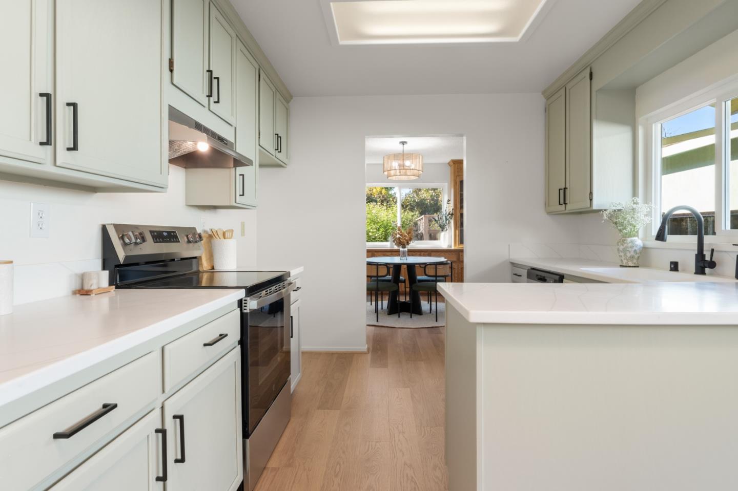 643 Peartree Drive Watsonville, CA 95076 - Photo 6 of 26 a kitchen with counter top space and cabinets