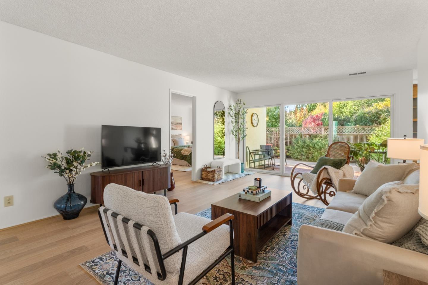 643 Peartree Drive Watsonville, CA 95076 - Photo 8 of 26 a living room with furniture potted plant and a large window
