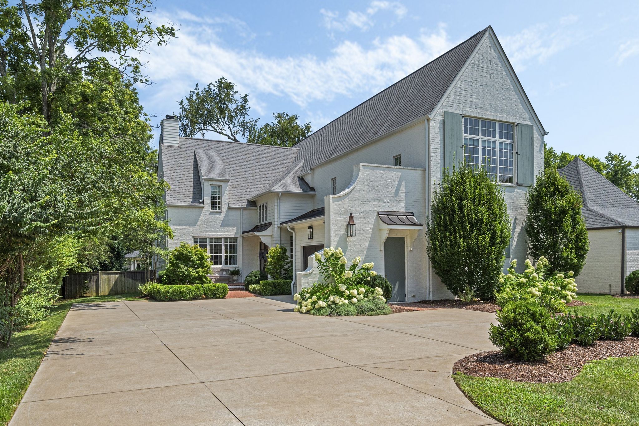 154 A Cheek Road Nashville, TN 37205 - Photo 1 of 61 front view of a house with a yard