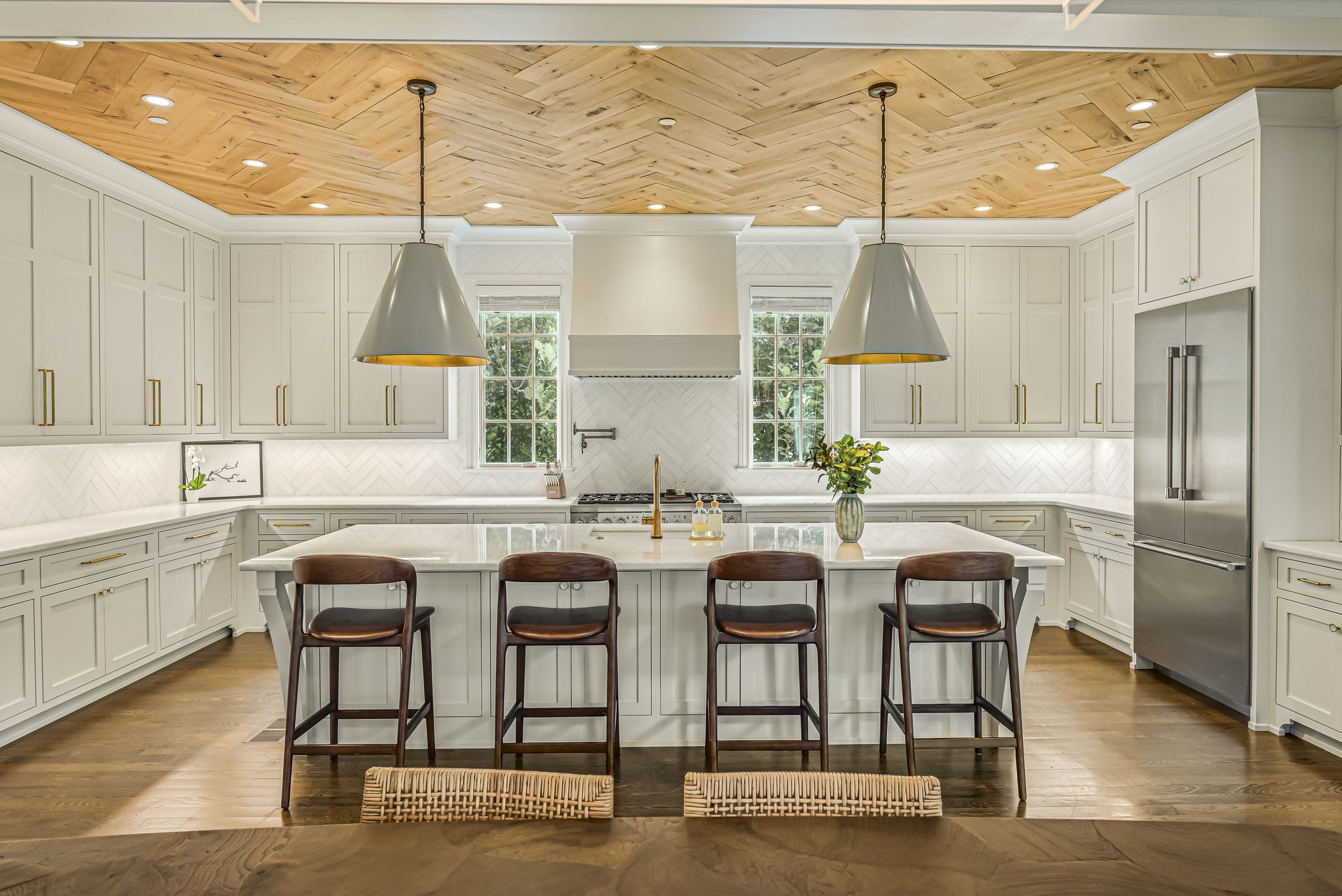 154 A Cheek Road Nashville, TN 37205 - Photo 13 of 61 a kitchen with a table chairs sink and cabinets