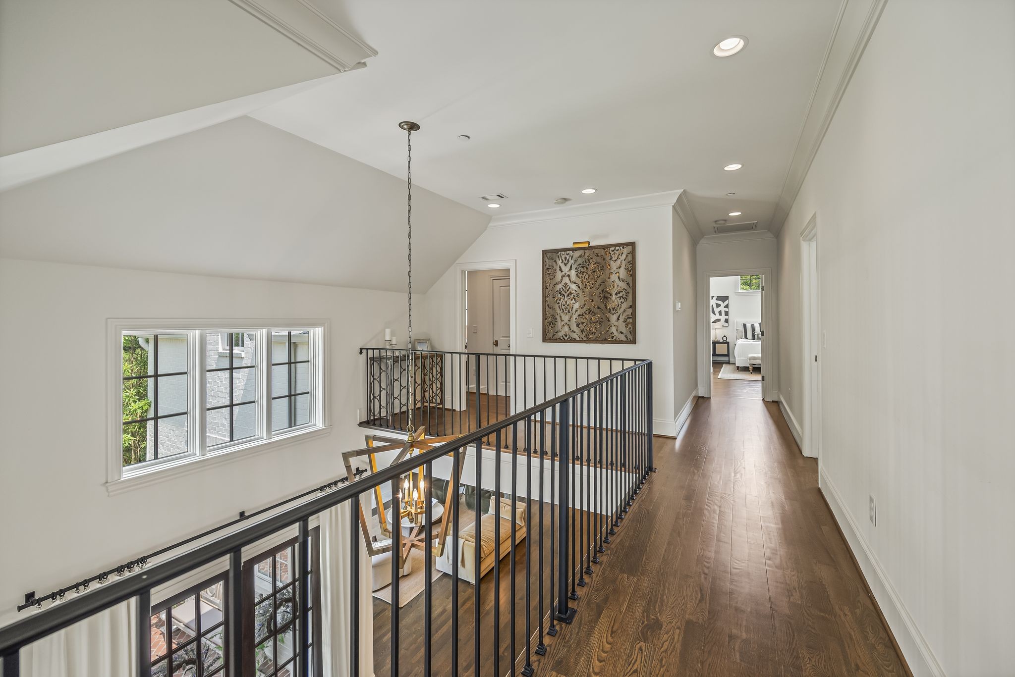 154 A Cheek Road Nashville, TN 37205 - Photo 38 of 61 a view of a hallway with wooden floor and windows