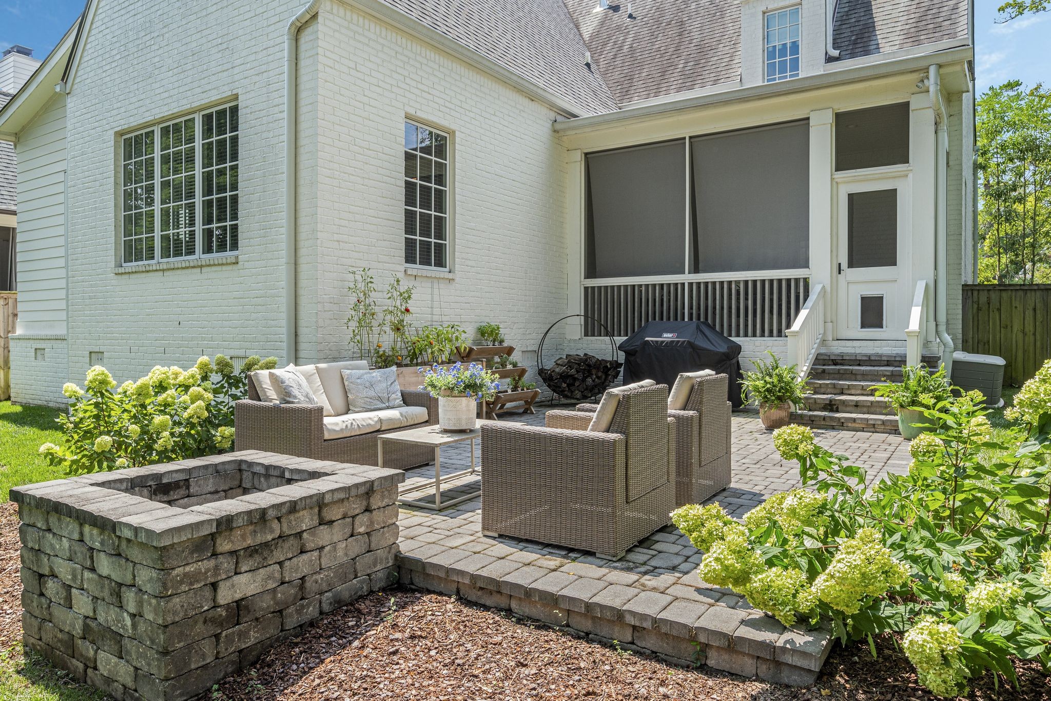 154 A Cheek Road Nashville, TN 37205 - Photo 56 of 61 a building outdoor space with patio furniture and potted plants