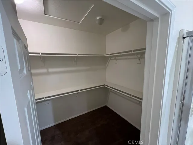 a view of an empty walk in closet
