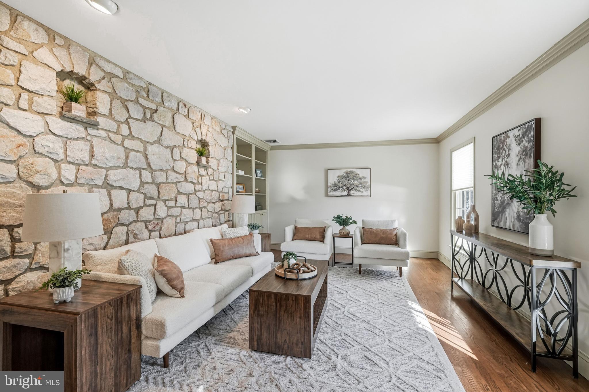 9 Log Cabin Road Perkasie, PA 18944 - Photo 12 of 47 Living Room with Stone Wall Accent