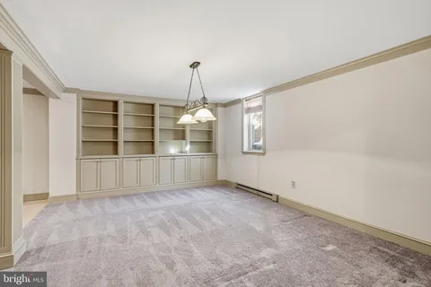 a kitchen with stainless steel appliances granite countertop a sink and a stove