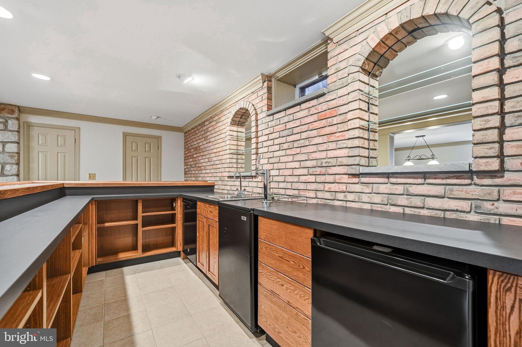 9 Log Cabin Road Perkasie, PA 18944 - Photo 38 of 47 Lower Level Full Bar with Appliances