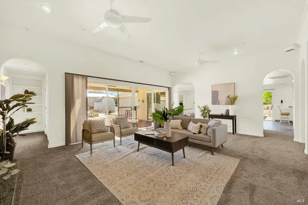 a view of a dining room with furniture window and outside view