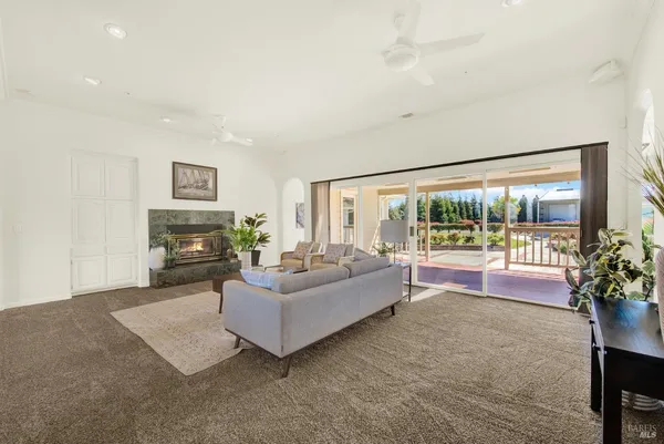 a close view of a sink a counter and a stove in a room