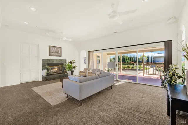 a close view of a sink a counter and a stove in a room