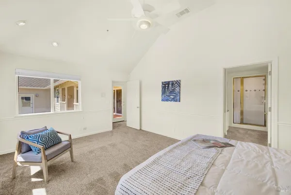 a view of a swimming pool with a yard and lake view