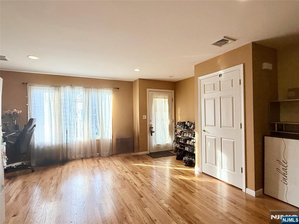 58 River Street, Unit B Lodi, NJ 07644 - Photo 2 of 11 a view of livingroom with hardwood
