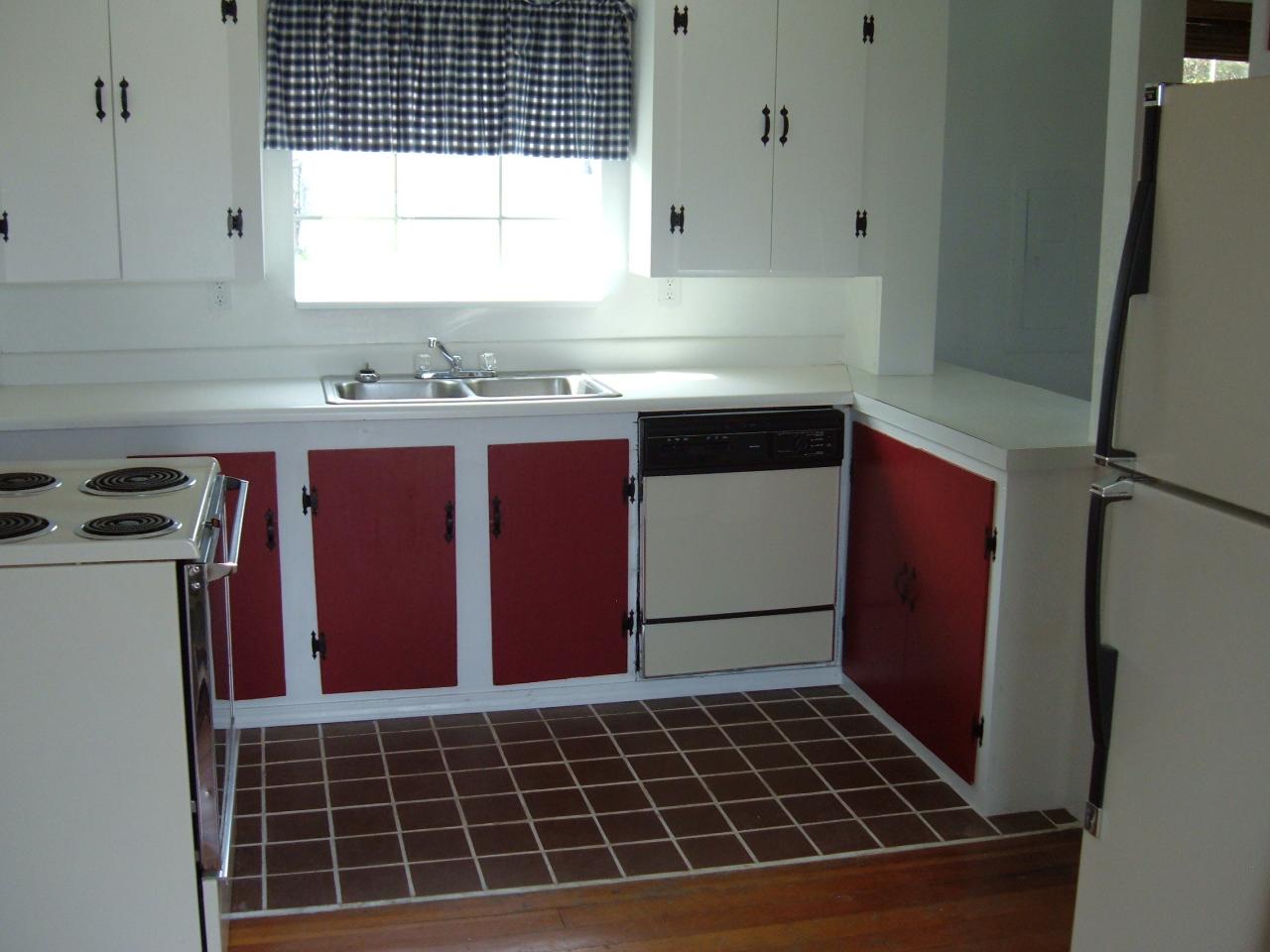 10502 Ahtanum Road Yakima, WA 98903 - Photo 3 of 7 a kitchen with a refrigerator and window