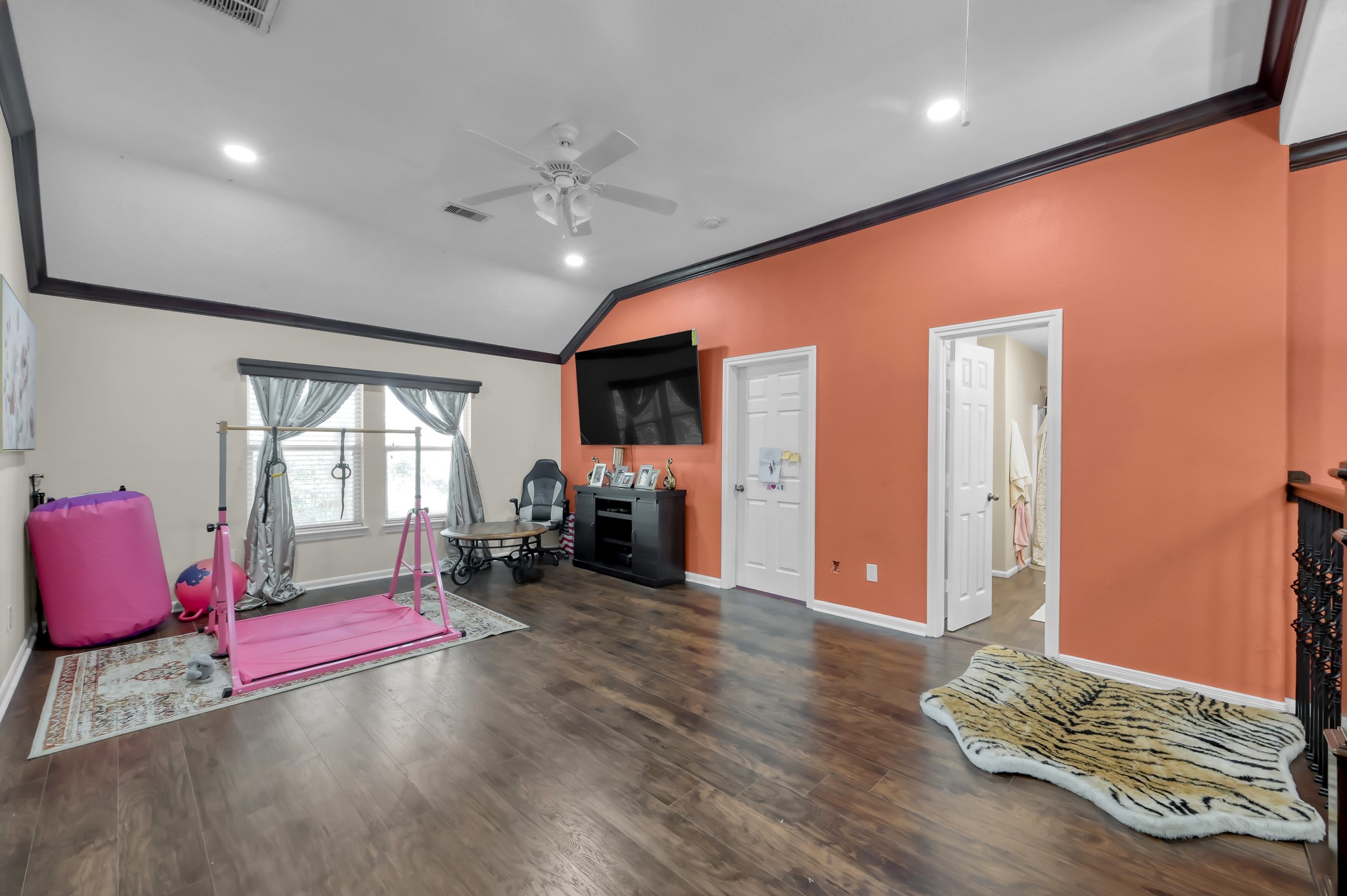 1000 Arbor Way Conroe, TX 77303 - Photo 20 of 29 Ideal for a playroom or gameroom, with ample floor space for activities.