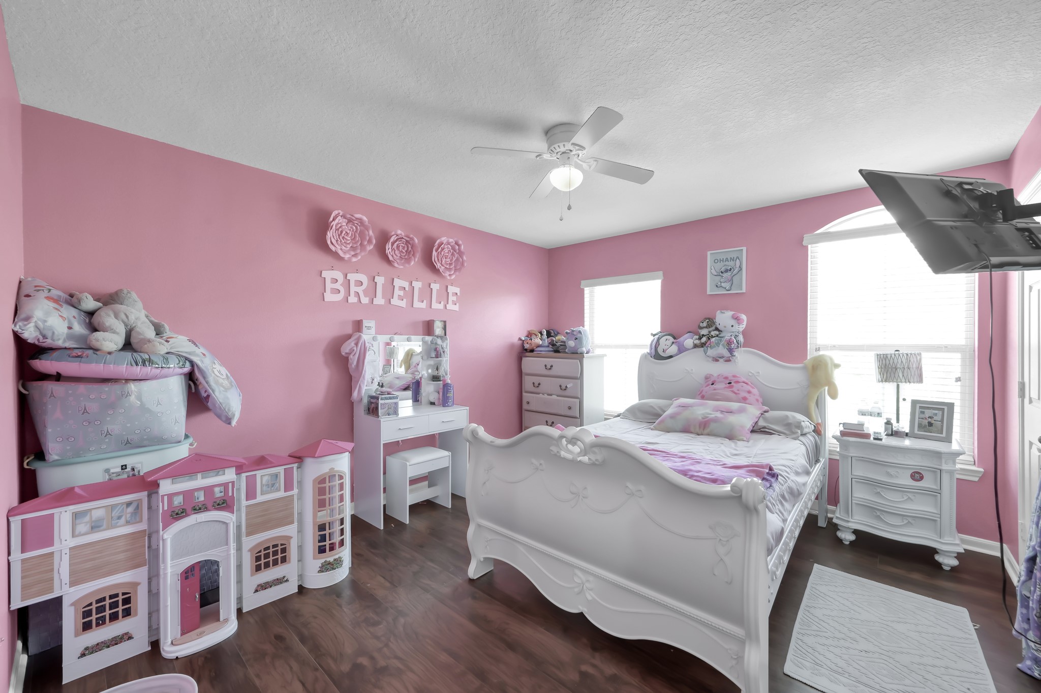 1000 Arbor Way Conroe, TX 77303 - Photo 24 of 29 Secondary Bedroom. Natural light fills the space, creating a bright and inviting atmosphere.